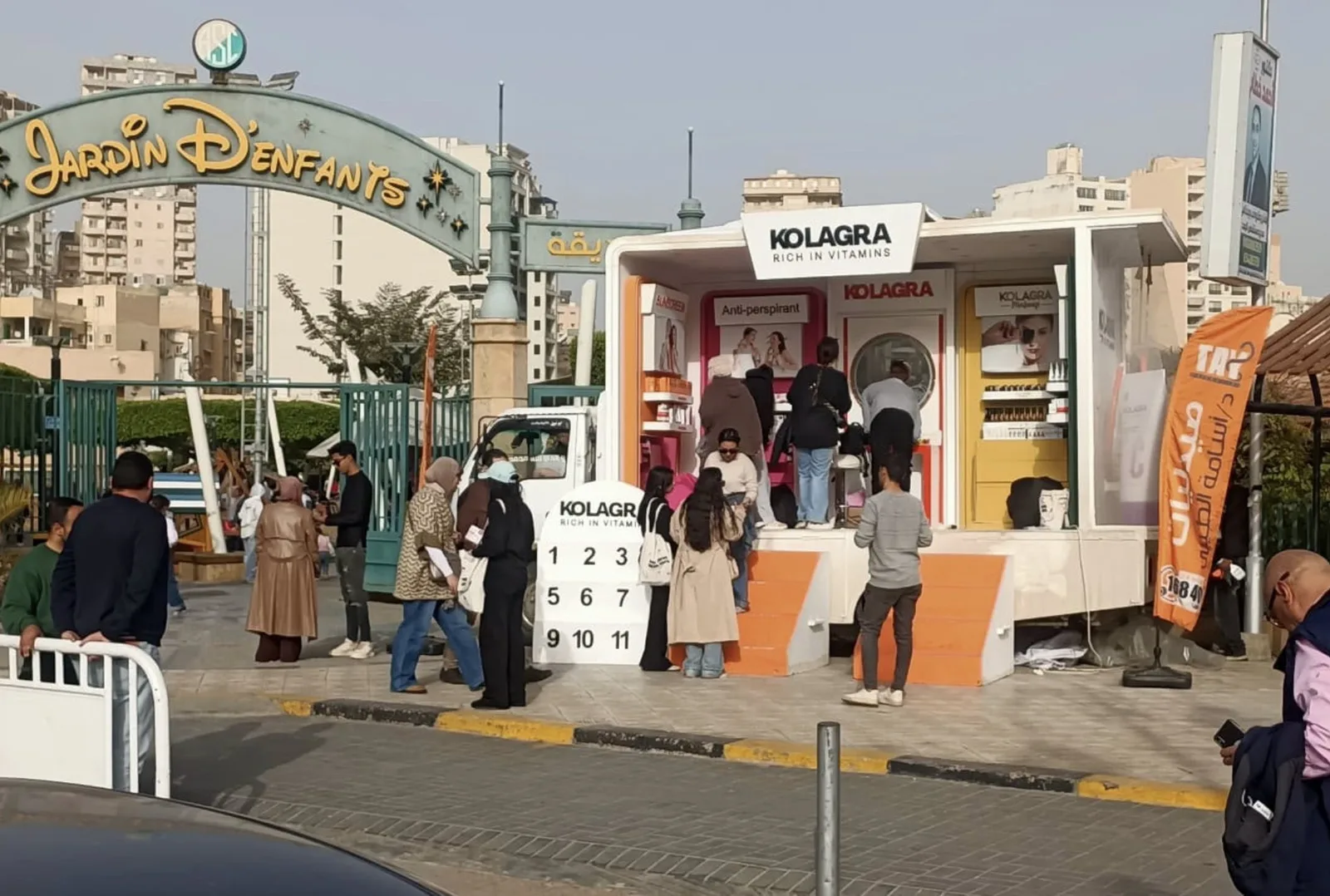 Crowd of people engaging with a Media Craft branded activation booth